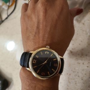 Black Singapore MOVT women's watch.